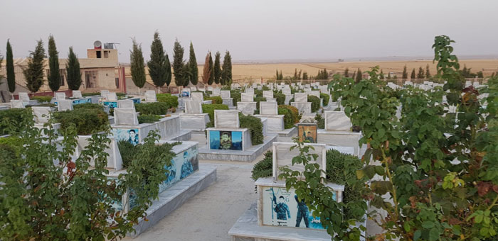 Graves at a burial ground between Debersiya and Amouda. The deceased fought the Islamic State 