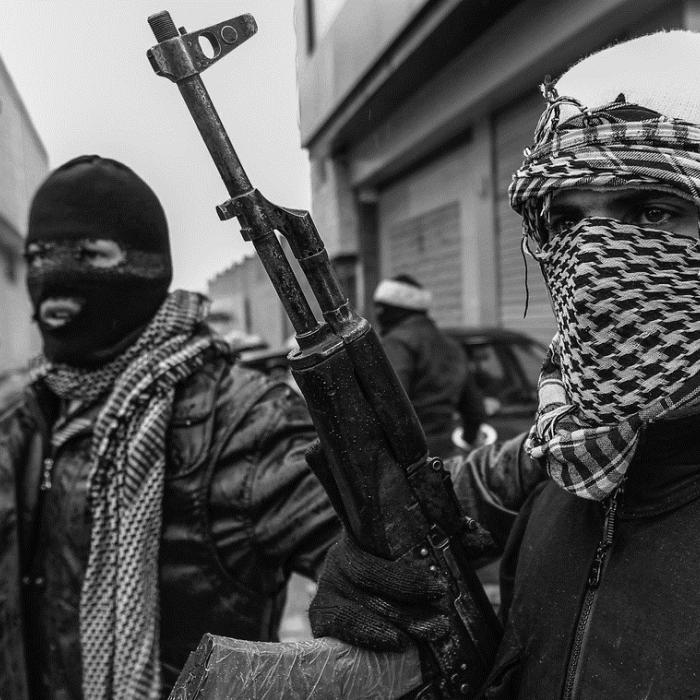 The balance-sheet of conflict: criminal revenues and warlords in Syria